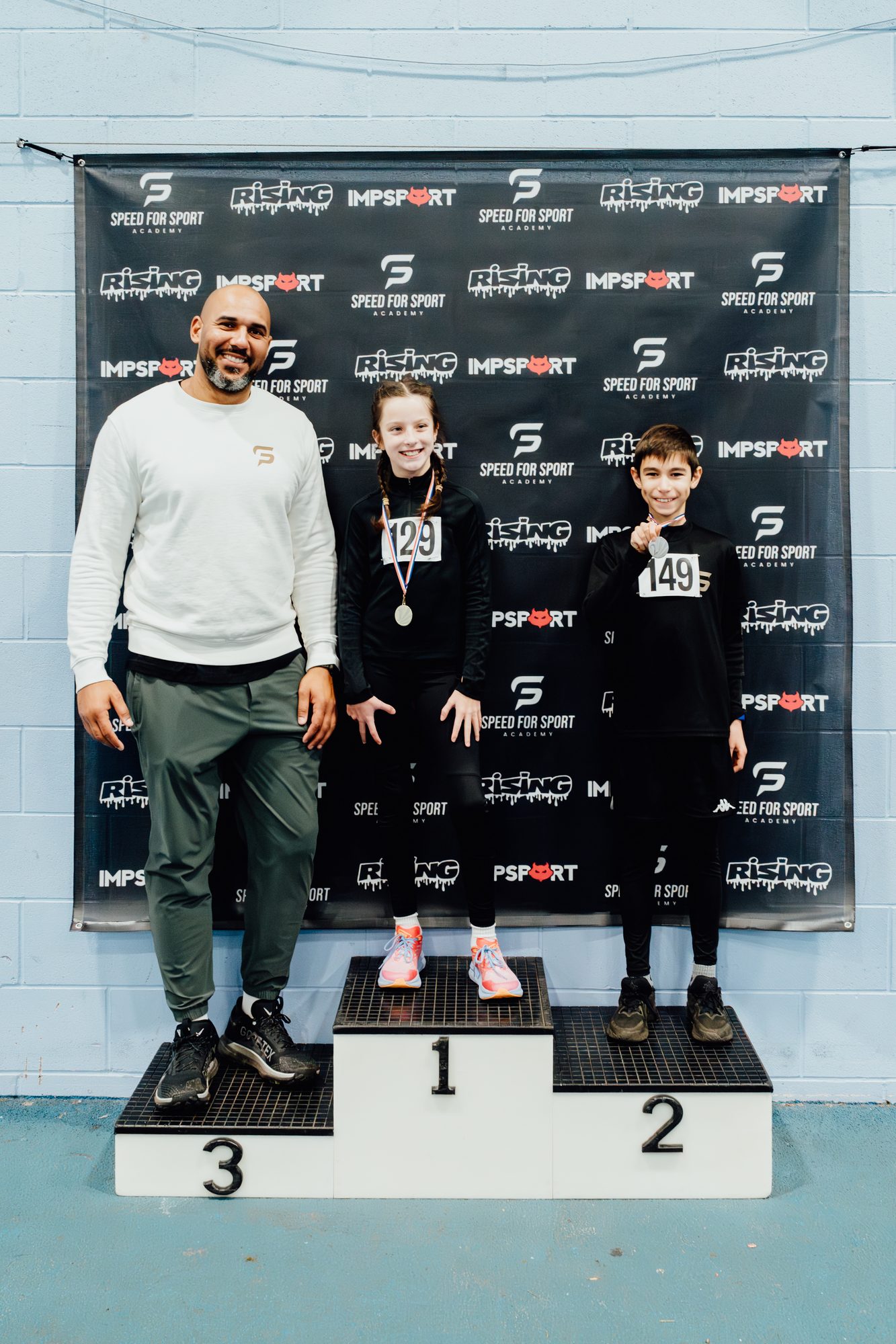 Speed For Sport athlete celebrating on the podium