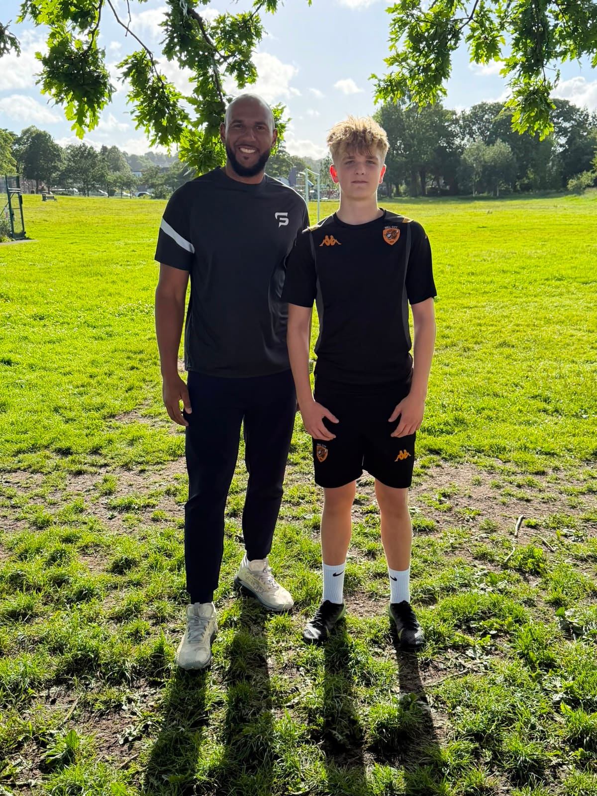 Tim Abeyie with a young academy footballer after 1-to-1 coaching